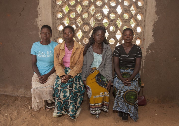 From left: Underage brides Yvone Kambiza, 16, Alinafe Naison, 19, Catherine Julio Funsani, 21, and Katrina Kampingo, 15, visit a local organization that aims to fight early marriages and teenage pregnancies in Malawi.