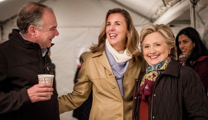 Katie McGinty, second from left, chats with Sen. Tim Kaine (D-Va.) and Democratic presidential nominee Hillary Clinton in Philadelphia, Oct. 22, 2016.