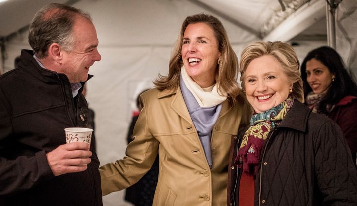 Katie McGinty, second from left, chats with Sen. Tim Kaine (D-Va.) and Democratic presidential nominee Hillary Clinton in Philadelphia, Oct. 22, 2016.