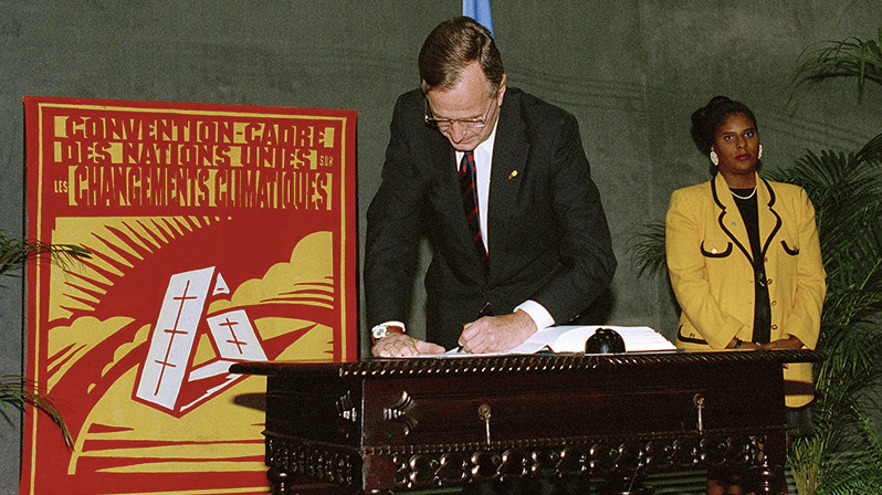 President George H. W. Bush signs the UN Framework Convention on Climate Change