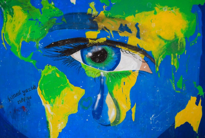 <em>A mural by former resident, Ismail Yazidi, at Ritsona Refugee Camp.</em>