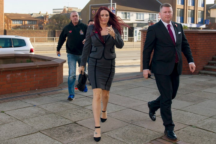 Paul Golding (right), leader of Britain First, and the party's deputy leader, Jayda Fransen, arriving at Luton Magistrates' Court.