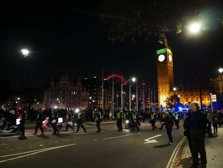 Police begin to form a circle around protestors.