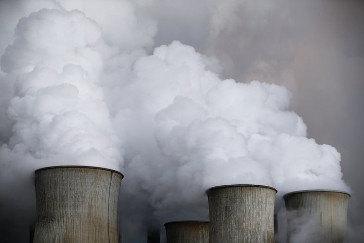 Steam from cooling towers of the coal power plant of RWE, one of Europe's biggest electricity and gas companies in Niederaussem, Germany, March 3, 2016.