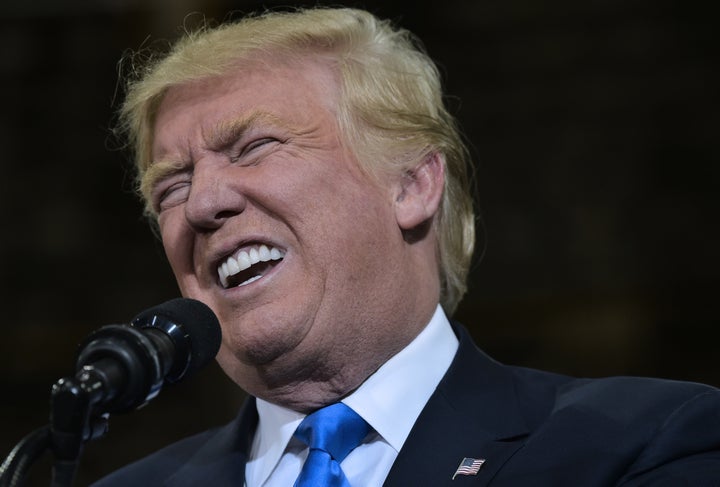 Republican presidential nominee Donald Trump addresses a campaign rally at the National Western Complex in Denver, Colorado on November 5, 2016.