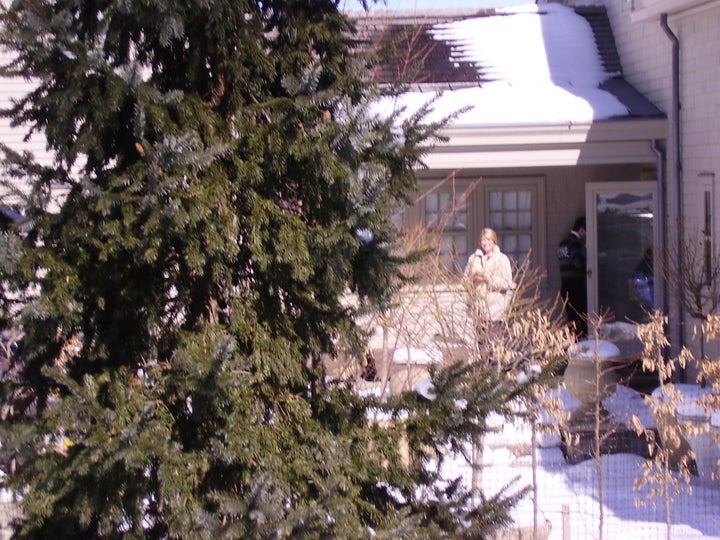 <p>Martha Stewart under house arrest in front of her Bedford, New York, home in 2005. </p>