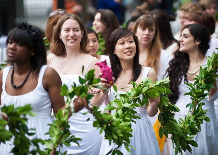 Graduating seniors at Mount Holyoke College in South Hadley, Massachusetts wear all white and carry a laurel chain to honor their connection to generations of women past. 