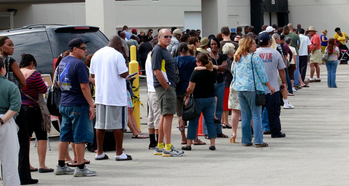 Long lines of voters are seen at the Supervisor of Elections office in West Palm Beach, Florida November 5, 2012.