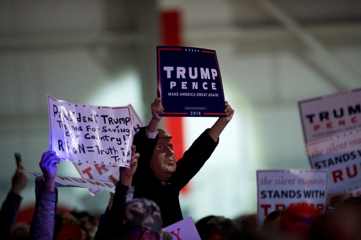 Supporters cheer for Republican presidential nominee Donald Trump during a rally at Atlantic Aviation in Moon, Pennsylvania.