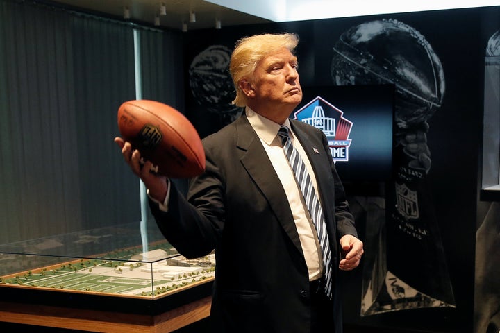 Donald Trump tours the Pro Football Hall of Fame in Canton, Ohio, in September. The GOP presidential nominee has said he'd like to keep the name of the Washington football team, which many