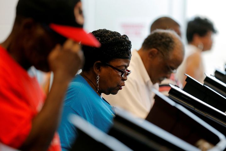 Voters cast their ballots during early voting in Charlotte, North Carolina, on Oct. 20, 2016. Turnout is down among African-American voters this year.