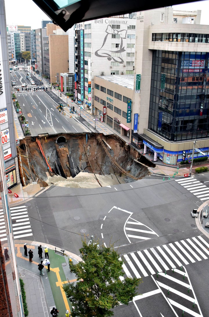 Miraculously no one was injured when the pre-dawn sinkhole opened in Fukuoka