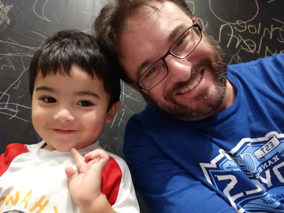 Phil Lazarus, pictured with his son Dino, says he won't return to live in the United States for at least four years