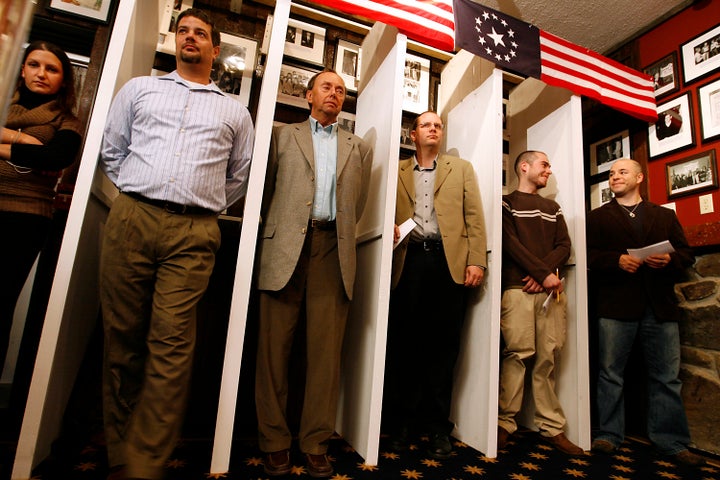 Dixville residents wait for the stroke of midnight to cast their votes