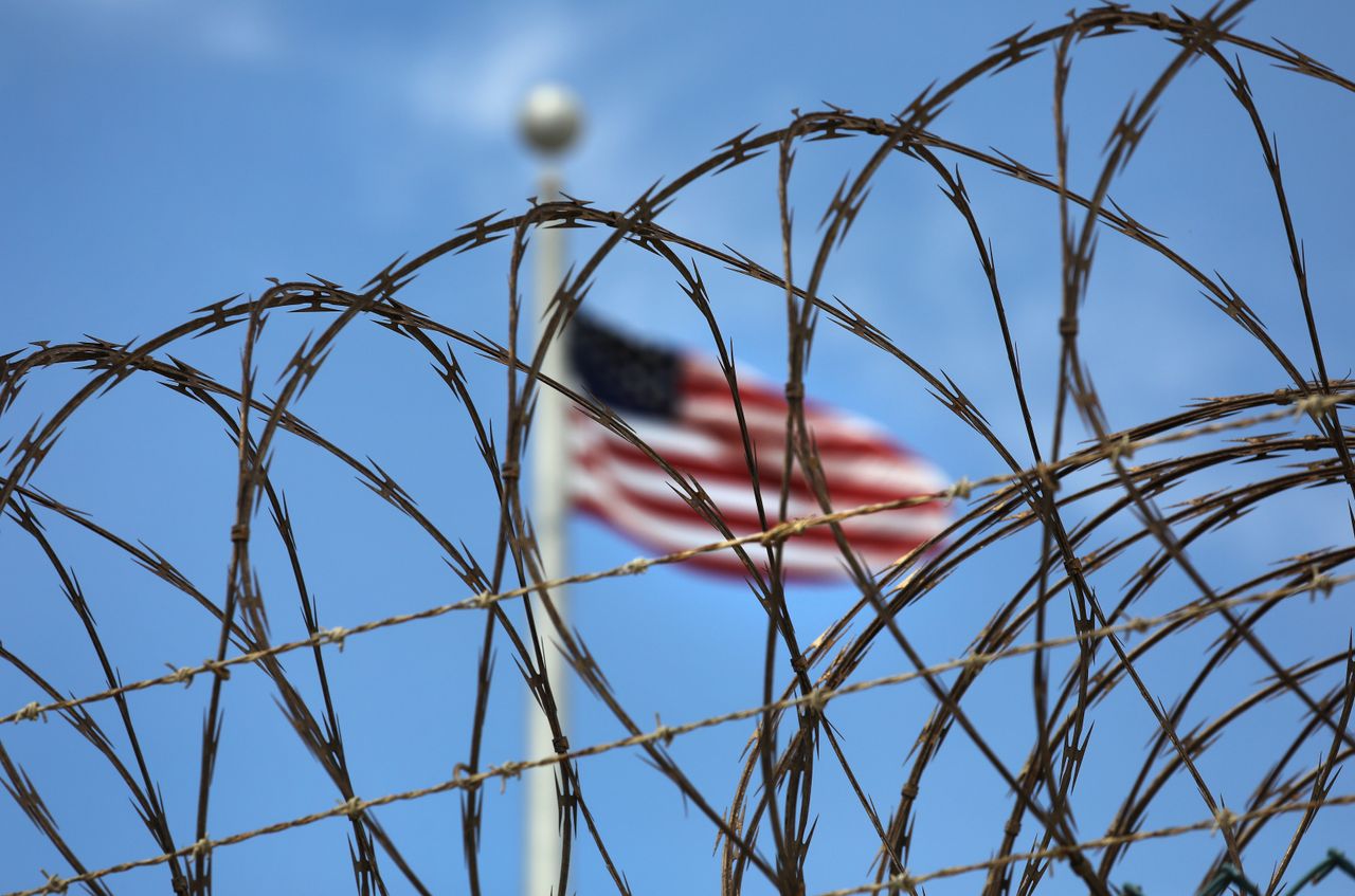 Razor wire tops the fence of the U.S. prison at Guantanamo Bay on Oct 23.
