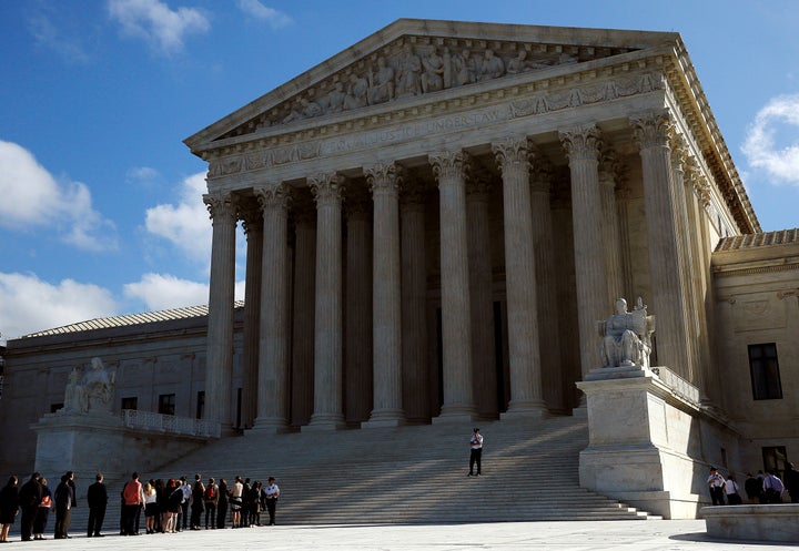 Visitors enter the U.S. Supreme Court in Washington, U.S. October 5, 2016.