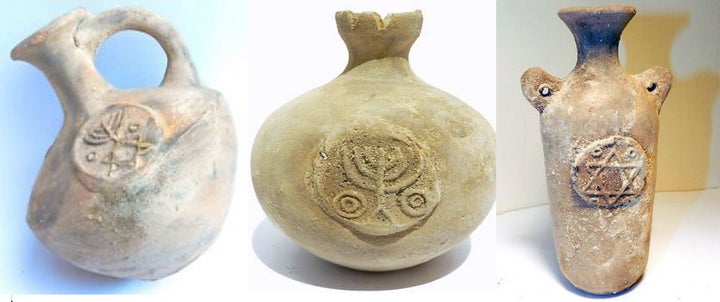 <p>Replicas of ancient Jerusalem terracotta/clay wine jugs with jewish symbols </p>