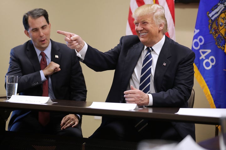 Wisconsin Gov. Scott Walker (R) campaigns with Donald Trump in Altoona, Wisconsin, on Nov. 1.