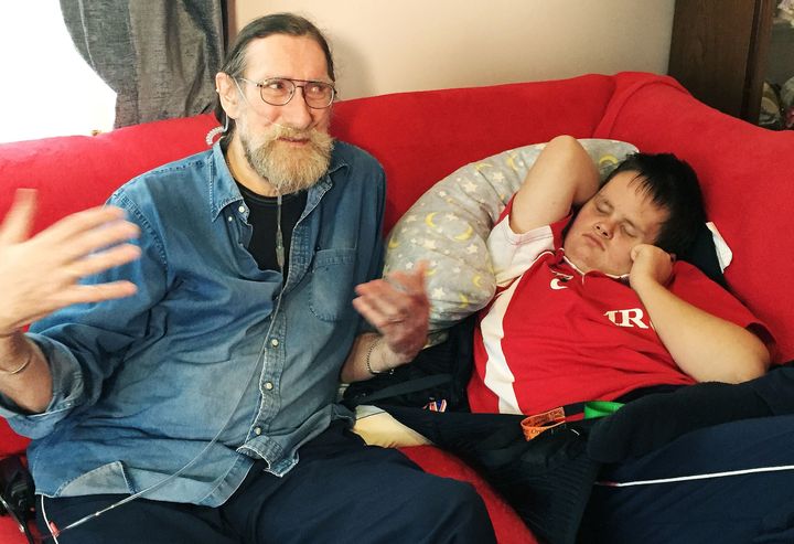 <strong>Paul Rutherford with his disabled grandson Warren.</strong>