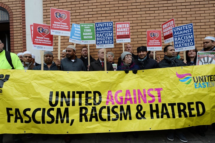 Muslims protest outside East London Mosque in Whitechapel after Trump called for Muslims to be banned from the US following the Paris terror attacks