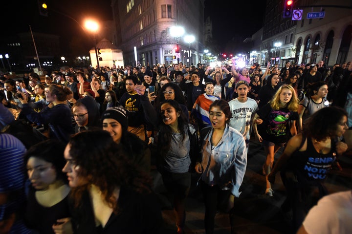 A demonstrator was reportedly hit by a car during protests in Oakland 