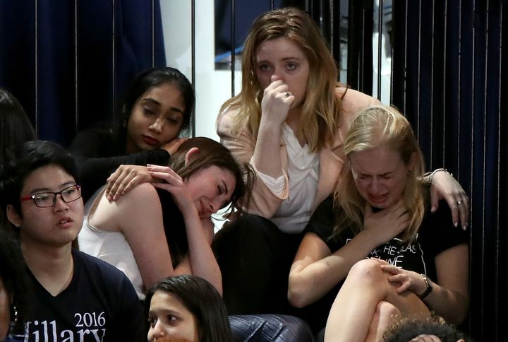 A group of women react as voting results come in at Democratic presidential nominee former Secretary of State Hillary Clinton's election night event.