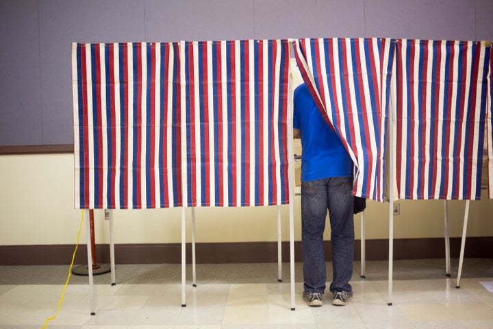 A voter fills out a ballot in Portland, Maine, on Nov. 8.