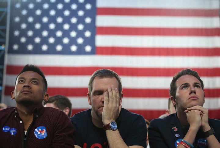 Supporters of Democratic U.S. presidential nominee Hillary Clinton react as they watch results at the election night rally in New York, Nov. 8.