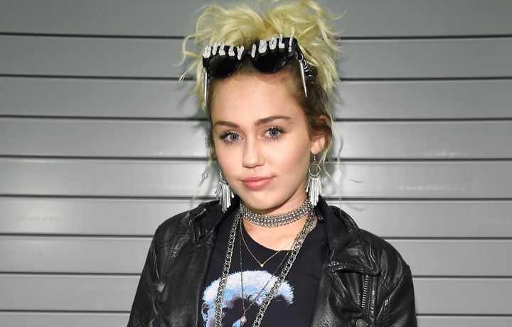 "And so Donald Trump, I accept you," Miley Cyrus said as she choked back tears in a video posted online Wednesday. 