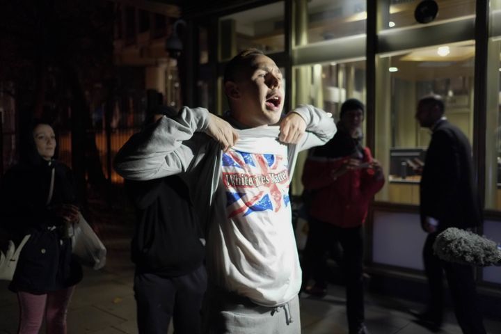 The EDL supporter shows off his 'White Lives Matter' T-Shirt