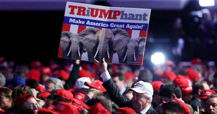 A supporter holds up a sign in support of Republican presidential nominee Donald Trump 