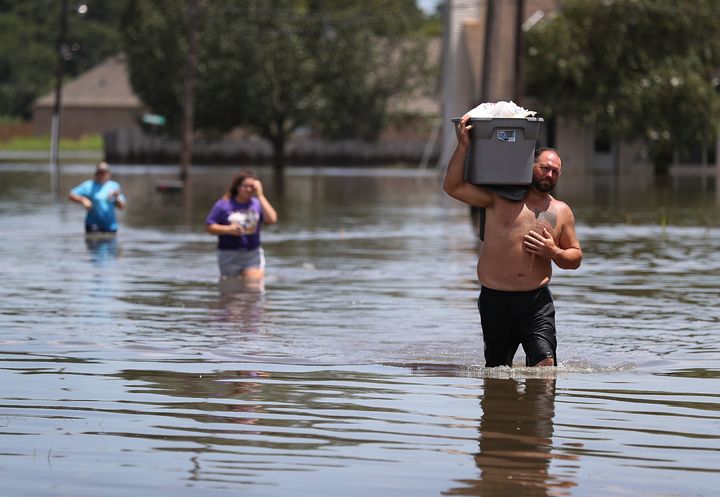 Limiting climate change to under 2 degrees Celsius above pre-industrial levels would reduce the impact of events such as the climate-change related floods that inundated Louisiana in August, scientists say.