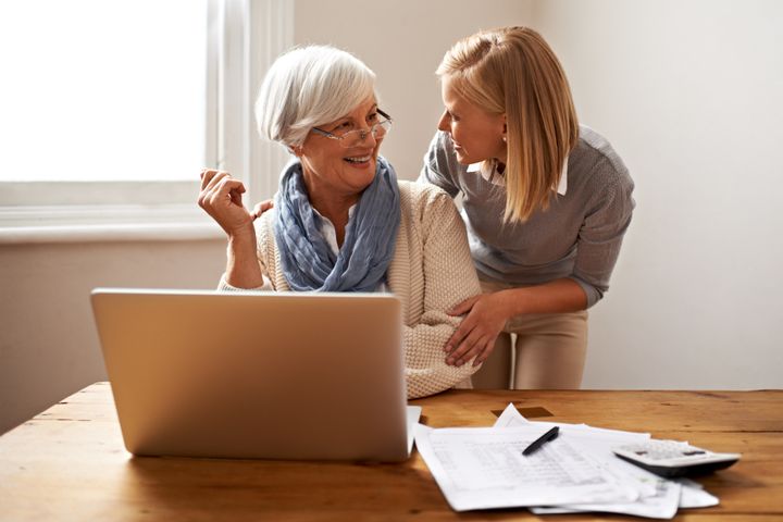 Cropped view of a senior woman receiving help with her finances from her granddaughterhttp://195.154.178.81/DATA/i_collage/pi/shoots/783362.jpg PeopleImages via Getty Images