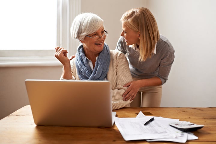 Cropped view of a senior woman receiving help with her finances from her granddaughterhttp://195.154.178.81/DATA/i_collage/pi/shoots/783362.jpg PeopleImages via Getty Images