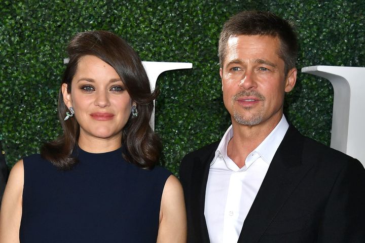 <strong>Brad Pitt walked the red carpet with co-star Marion Cotillard</strong>