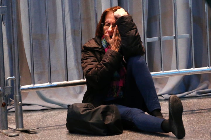 A Hillary Clinton supporter breaks down in tears at the end of election night at the Jacob K. Javits Convention Center in New York.