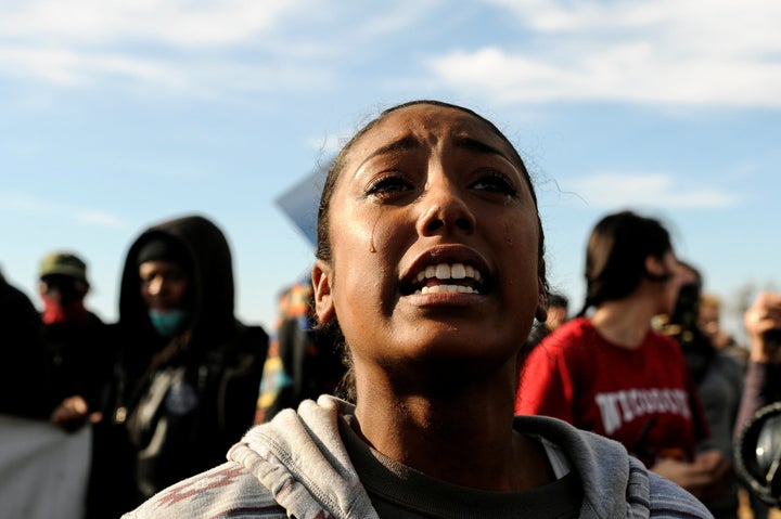 A woman cries during a protest against the Dakota Access pipeline near the Standing Rock Indian Reservation in North Dakota.