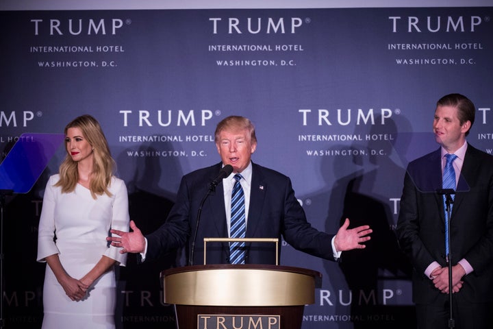 Donald Trump is seen with Ivanka Trump, one of his daughters, and Eric Trump, one of his sons, at the grand opening of the Trump International Hotel in Washington, D.C.