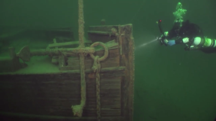 A diver approaches the J.S. Seaverns, which sank in 1884.