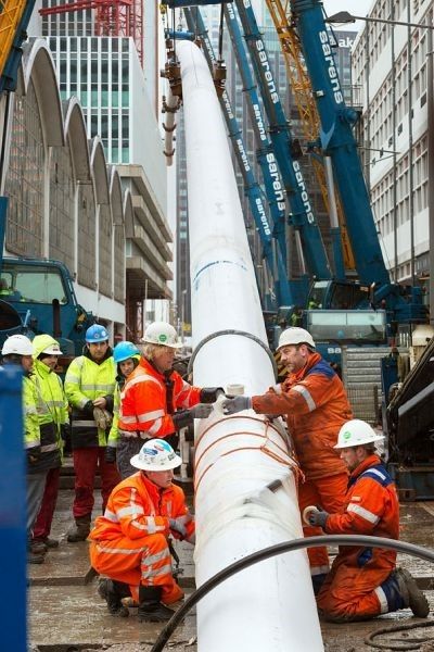 <p><em>Installing underground piping for Rotterdam's</em> <em>district heating system.</em> </p>