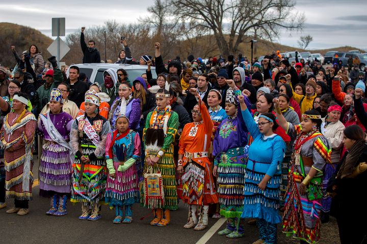 On October 27 at the Treaty/Sacred Ground camp front line, 40 Jingle dancers and hundreds of people stood in solidarity after the sacred ceremonial Jingle dance. It was very powerful and beautiful to witness the unity of all nations.