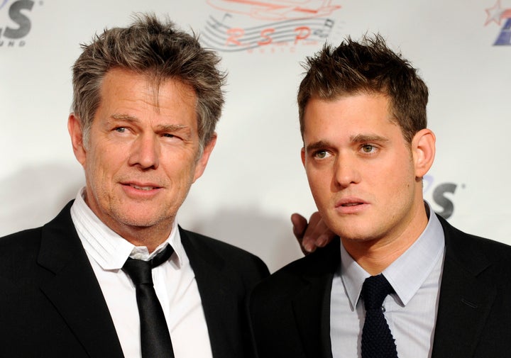 Composer David Foster and singer Michael Bublé pose together in 2009.