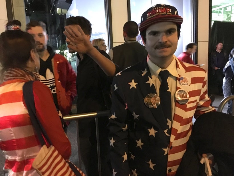 A Trump supporter in New York City across the street from the Hilton Midtown Manhattan Hotel, where the Republican candidate