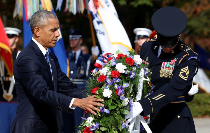 President Barack Obama lays a wreath at the Tomb of the Unknowns at Arlington National Cemetery on Nov. 11, 2016.