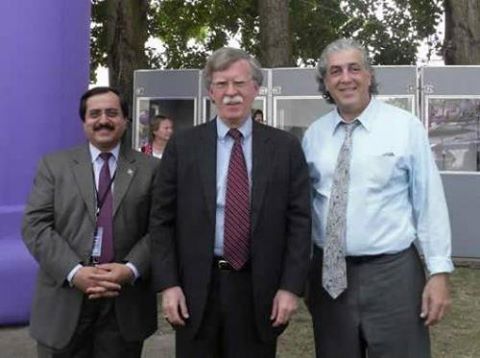 <p><strong>John Bolton with Mojahedin Khalq operatives </strong></p>