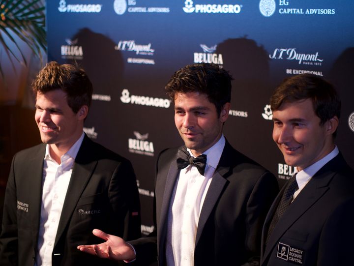 Magnus Carlsen and Sergey Karjakin with MC Adrian Grenier