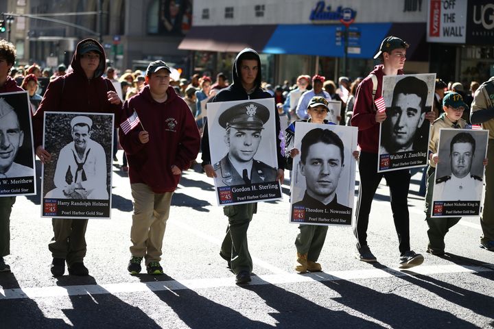 People attend the Veterans Day Parade in New York City on November 11, 2016 in New York City.