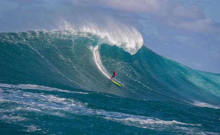 Paige Alms, pictured above, won the World Surf League's first-ever big wave surf competition for women.