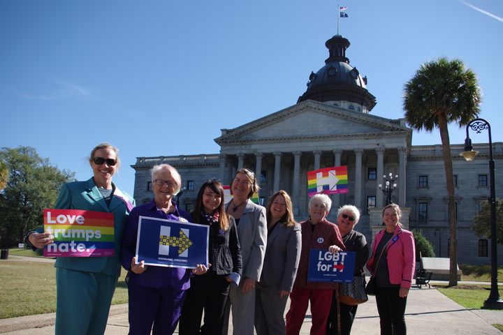 Members of Pantsuit Nation gather at the South Carolina State House the day before the election