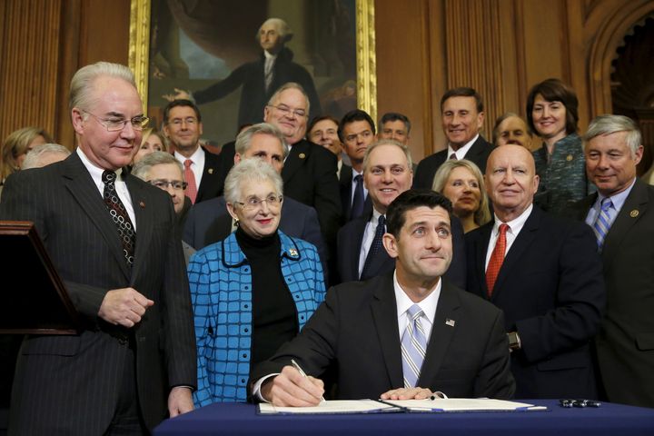 U.S. House Speaker Paul Ryan (R-WI) signs a bill repealing Obamacare at the U.S. Capitol in Washington January 7, 2016.